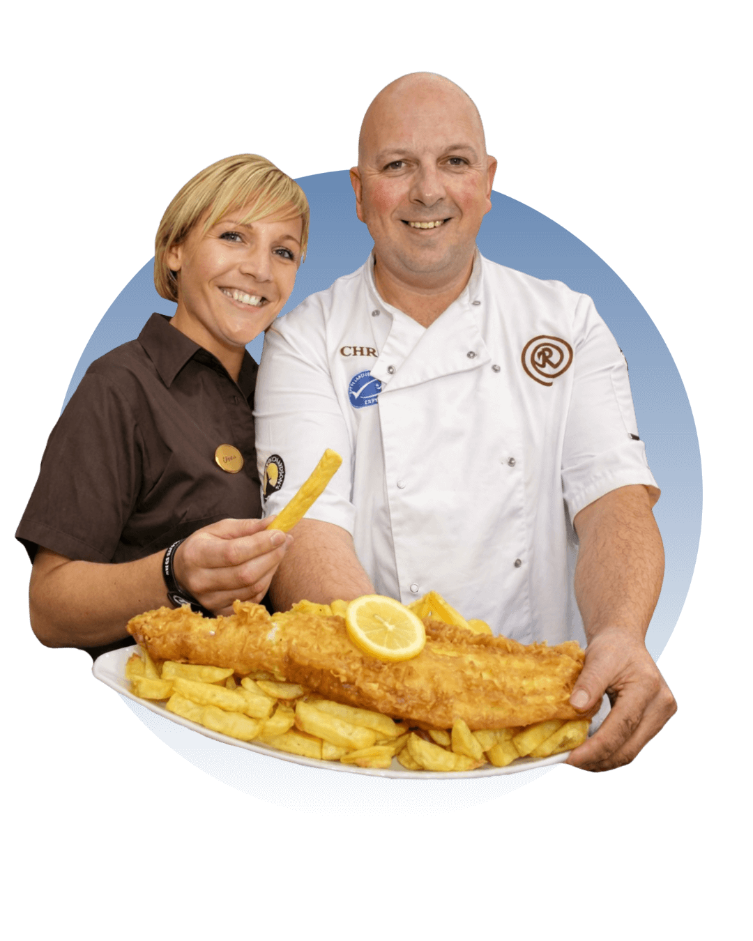 Fish and Chips held by Chris and his Wife